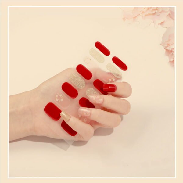 White and Gold Snowflake, gold glitter, bright red Nail Stickers. Quick and easy application, waterproof, and cruelty-free nail decals. Achieve trendy salon-quality nails at home. Lasts up to 14 days. Safe, stylish, and convenient.